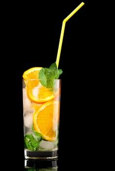 Mojito orange cocktail  on black background.