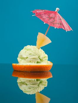 photo of cutted orange with ice cream . Shallow depth-of-field