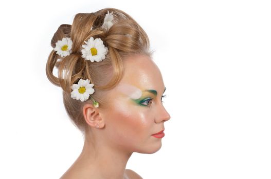 Portrait of beautiful girl  blonde with flowers in her hair on white background   