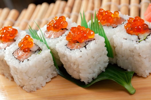 Japanese sushi  traditional japanese food.Roll made of Smoked fish and red roe