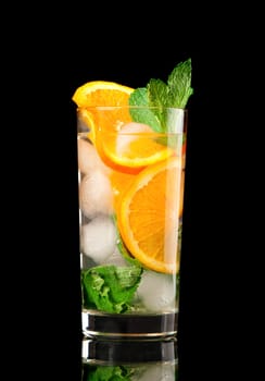 Mojito orange cocktail  on black background.