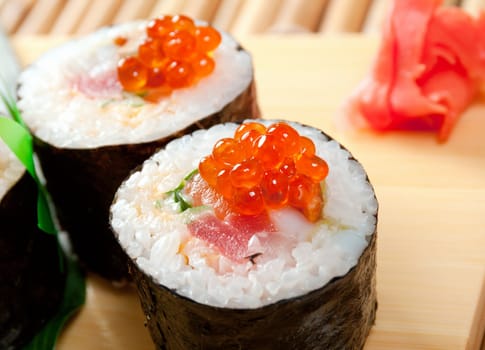 Japanese sushi  traditional japanese food.Roll made of Smoked fish and red roe