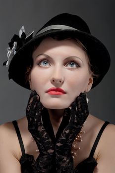 Woman retro revival portrait.girl in hat