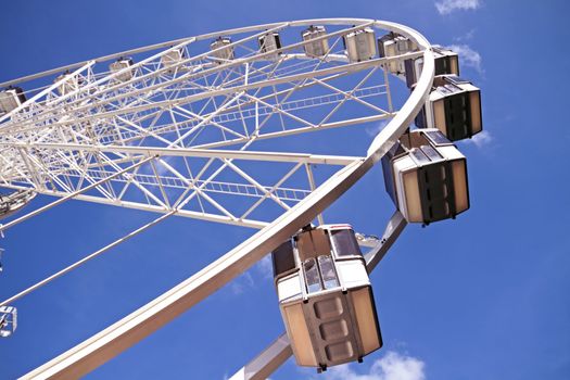 Ferris wheel against a blue sky