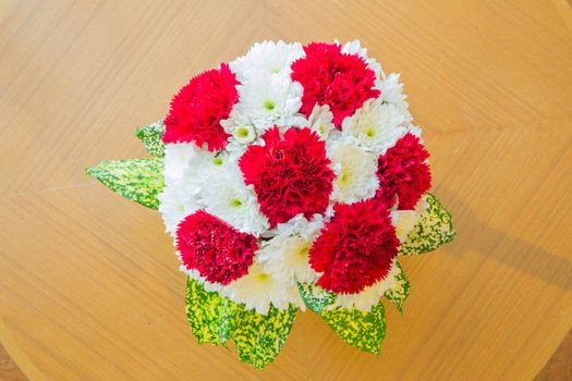 top view red Carnation bouquet using in wedding or any greeting ceremony