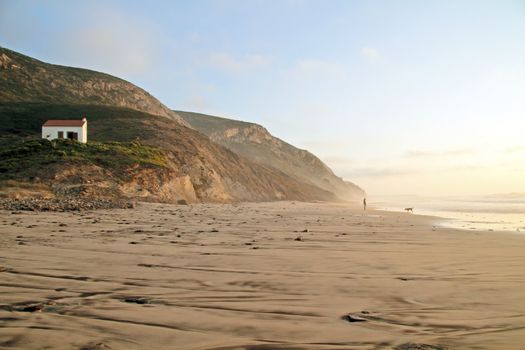 Sunset on beach Vale Figuiras in Portugal