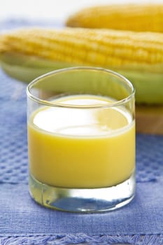 Fresh sweet corn juice by raw corns