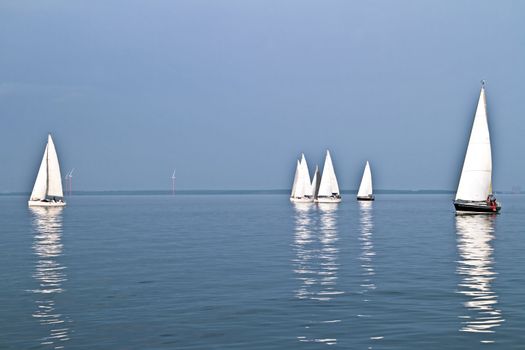 Sailing on the IJsselmeer at sunset in the Netherlands