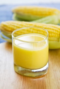 Fresh sweet corn juice by raw corns