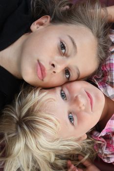 Two children looking at camera