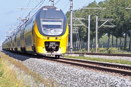 Train driving in the countryside from the Netherlands