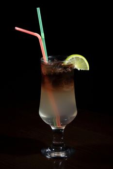 glass of Long Island cocktail on a bar