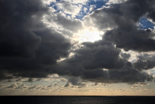 clouds with god rays on a beautiful cloudscape