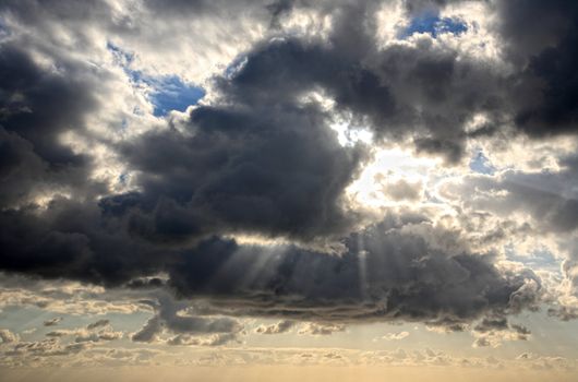 clouds with god rays on a beautiful cloudscape