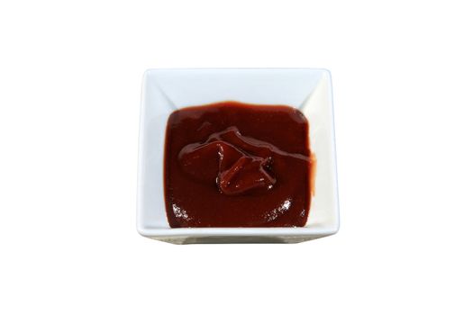 chilli bbq sauce on a bowl isolated on a white background