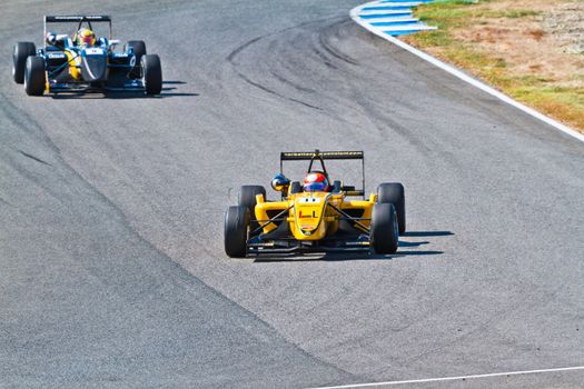 JEREZ DE LA FRONTERA, SPAIN - OCT 16: Matteo Tortan(11) followed by Yann Cunha (9) races on European F3 championship on October 16 , 2011, in Jerez de la Frontera , Spain
