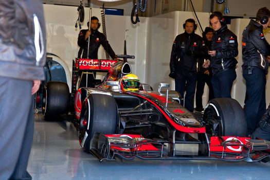JEREZ DE LA FRONTERA, SPAIN - FEB 10: Lewis Hamilton of McLaren F1 waiting on the pit on training session on February 10 , 2012, in Jerez de la Frontera , Spain
