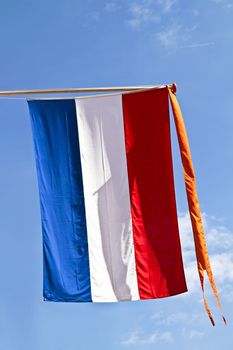 The dutch national symbol, the flag with orange streamer from the Netherlands