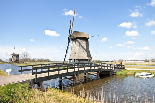 Traditional windmills in dutch landscape in the Netherlands