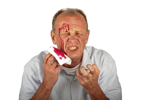 Wounded man with face full of blood on a white background