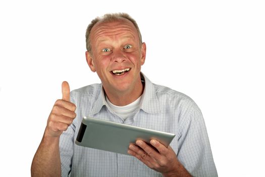 Happy man with thumbs up and his tablet computer on a white background