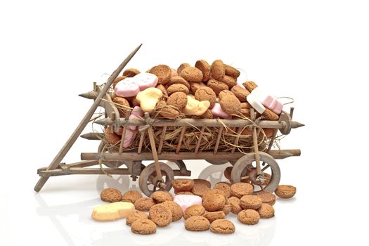 Old cart full of ginger nuts  for santa claus feast on the 5th of december