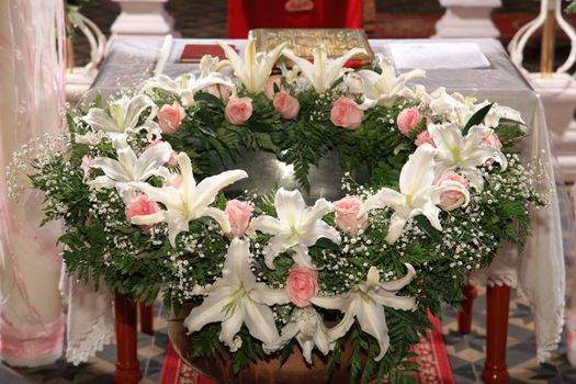 decoration with flowers on a christening bowl