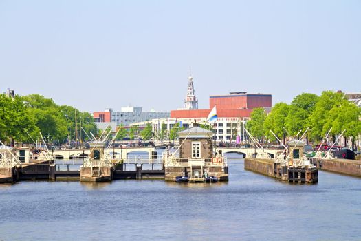 Floodgates in the river Amstel in Amsterdam the Netherlands