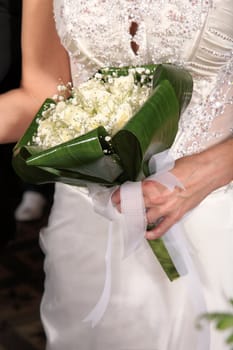 Bride holding her bouquet at the wedding