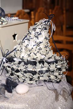 navy style christening favors at a church indoor