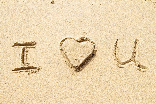 I love you written in sand for natural, love,tourism or conceptual designs