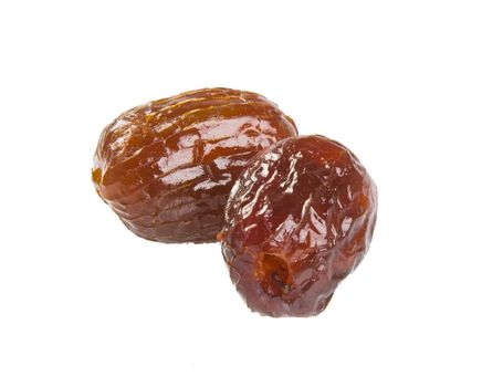 Dried preserved. Sweet syrup monkey apple or Chinese date on the background