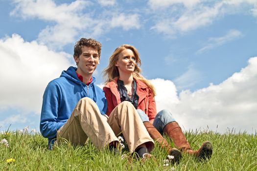 Young happy couple in the tulip fields from the Netherlands