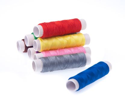 bobbins of thread on the background