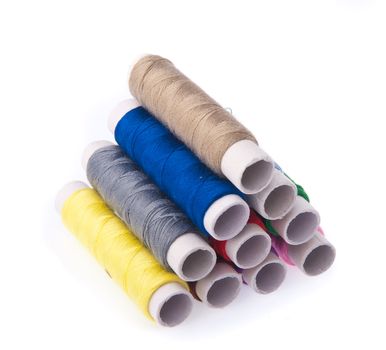 bobbins of thread on the background