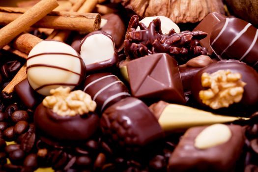 collection of different sweet chocolate pralines closeup background present sugar