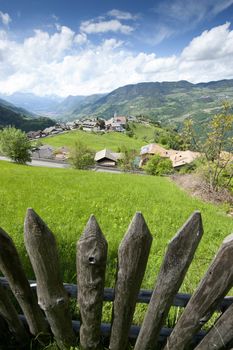 Wooden Fence in South Tyrol. View to Steinegg, a village near to Bozen