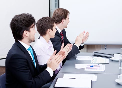 business team on table in office conference seminar presentation