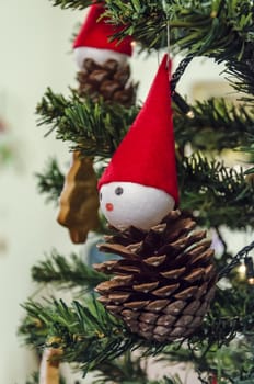 Creative handmade decorations on a christmas tree.