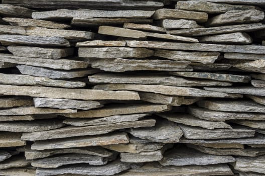Stacked stone tiles for exterior use.