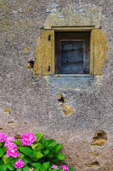 Small window on old french house, Burgundy.