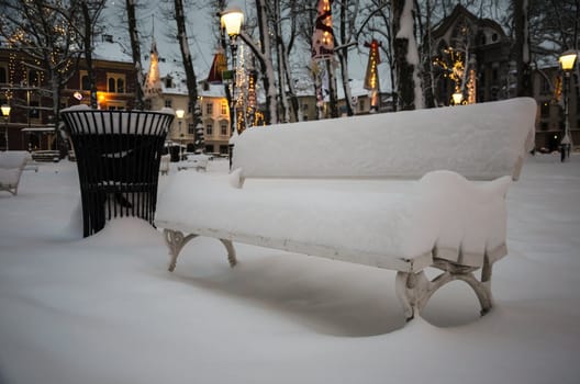 Bench in park cowered with snow in park, Ljubljana (8.12.2012), Slovenia.