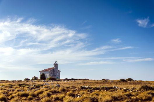 Abandoned lighthouse on a small island in Croatian Kornates, island Trstenik, Croatia.