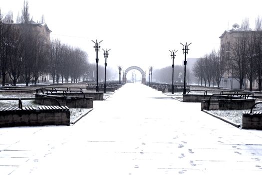 Winter alley in the snow in the city of Krivoy Rog in Ukraine