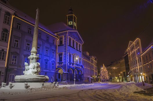 Ljubljana townhall square with recplica of Robba fountain in the winter time at night. Ljubljana, Slovenia, on December 8, 2012.