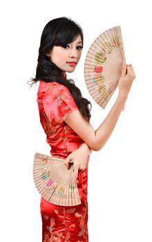 pretty women with Chinese traditional dress Cheongsam and hole Chinese Fan on white background