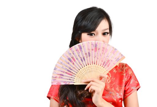 pretty women with Chinese traditional dress Cheongsam and hole Chinese Fan on white background