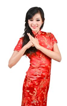 pretty girl with cheongsam wishing you a happy Chinese new year on white background