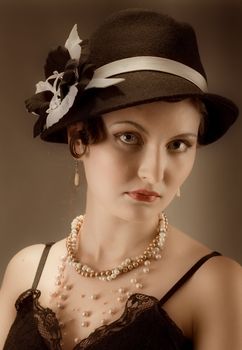 Woman retro revival portrait.girl in hat