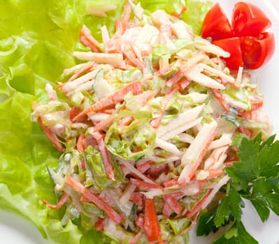 Healthy vegetarian Salad on the white plate over white